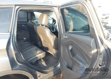 2013 Ford Escape Titanium z USA, uszkodzony, nr VIN 1FMCU9J91DUA06564